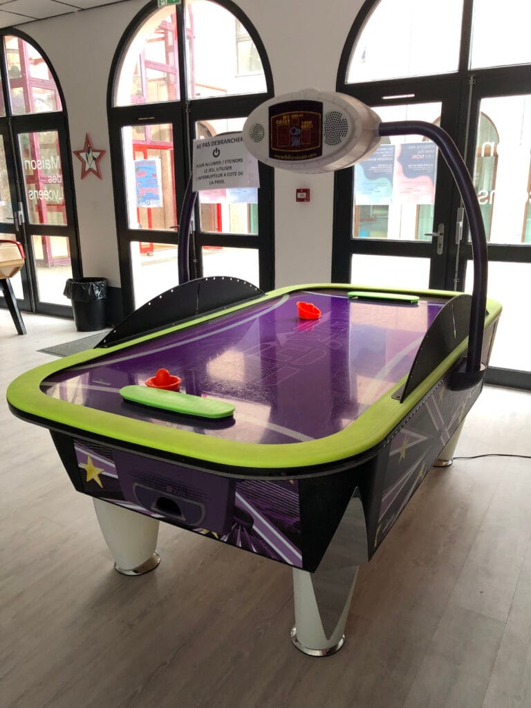 a air hockey table in a room